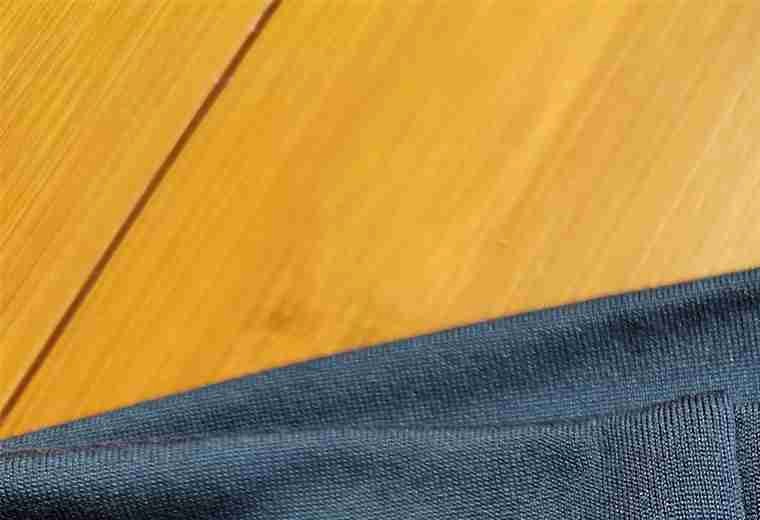 Anonymous close-up showing a seam detail checked during inspection