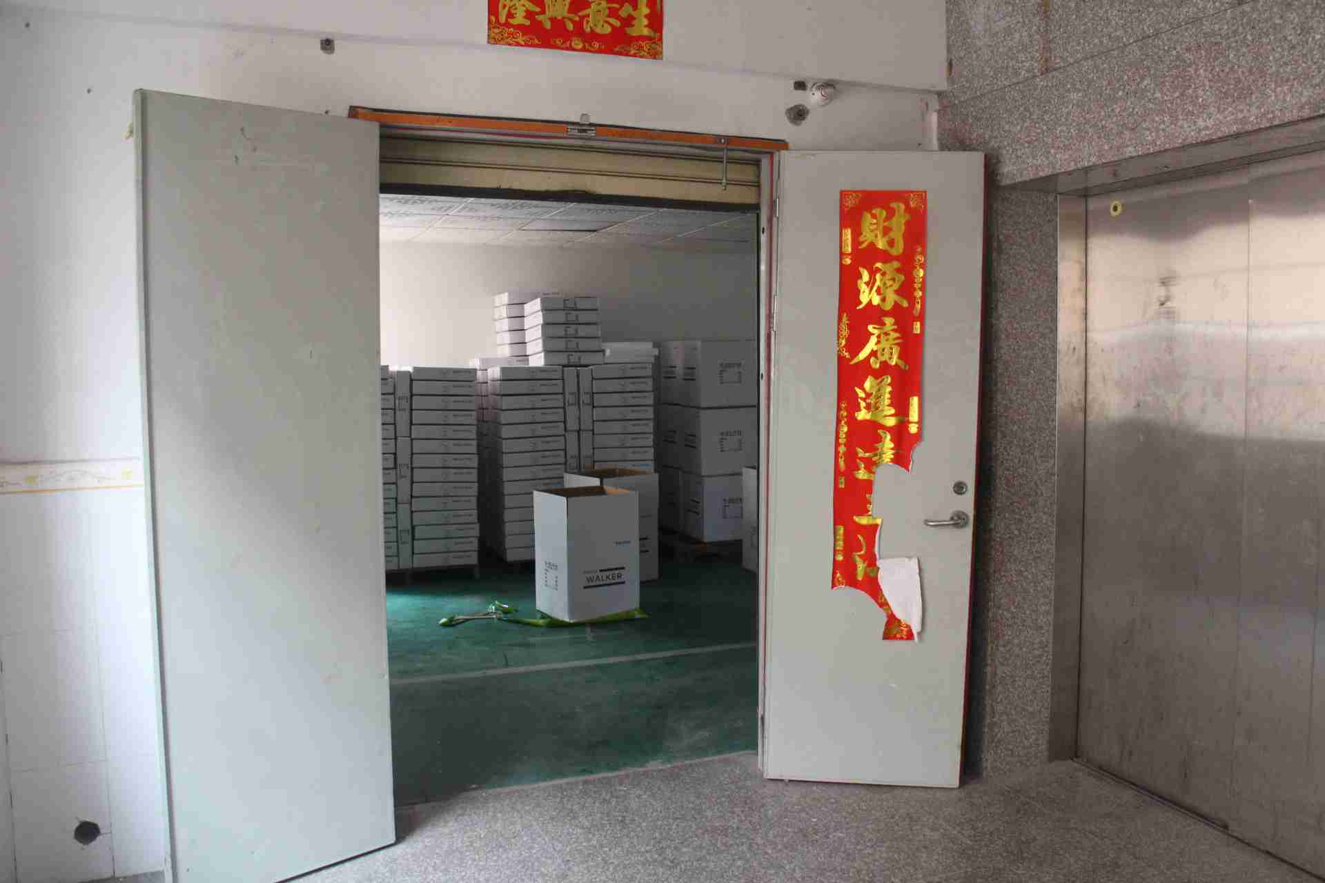 Factory entry and cartons observed during an anonymised China pre-shipment inspection